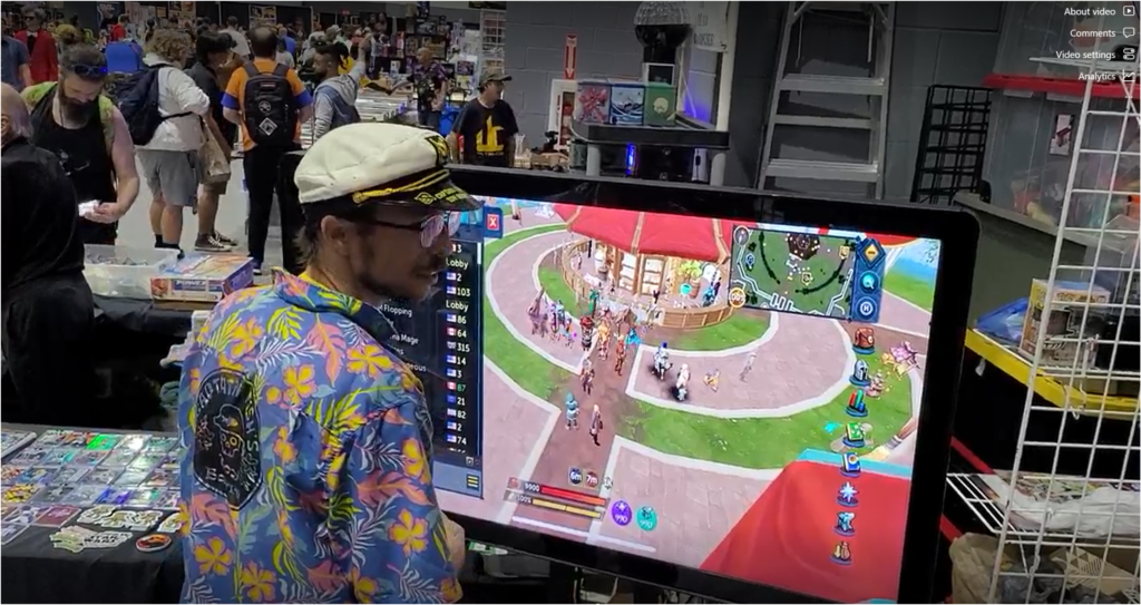 Attendee using a Padzilla touchscreen to play a game at UltraCon